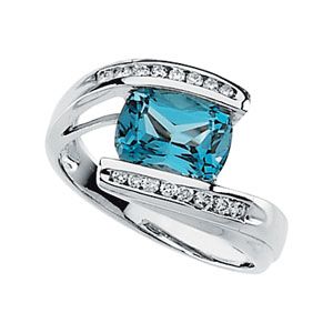 Genuine Swiss Blue Topaz and Diamond Ring