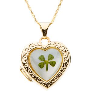 Mother of pearl locket with a 4 leaf clover on an 18